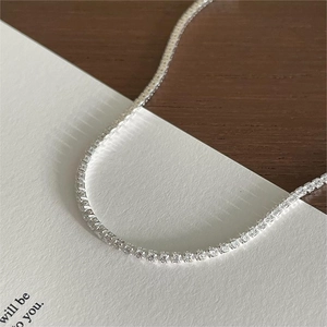 Sparkling S925 sterling silver tennis anklet with round zircon stones on white card