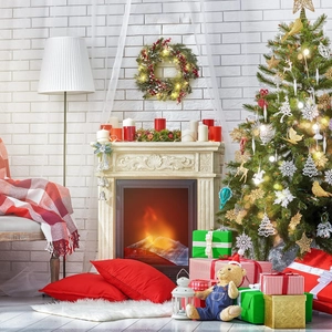 Cozy indoor Christmas setting with decorated tree, fireplace, and festive gift boxes