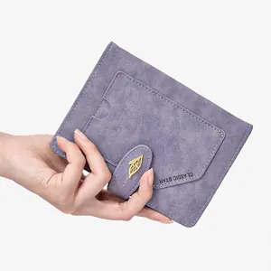 Lavender RFID blocking passport holder with golden leaf clasp and star texture