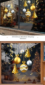 Detail of gold Christmas window decals featuring festive ornaments and Merry Christmas text