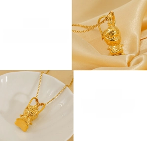 Close-up of golden Wukong pendant with detailed stainless steel hammer chain texture