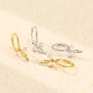 S925 silver bow earrings with cubic zirconia in gold and silver finishes