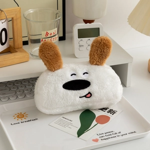 Detailed plush texture of a white cartoon dog pencil case with soft brown ears