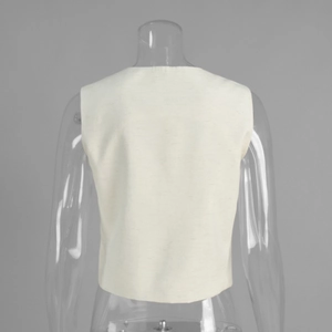 Back view of a slim-fit off-white sleeveless cotton vest on a transparent mannequin