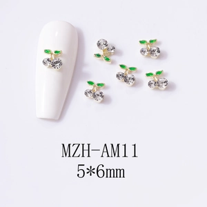 Macro view of 3D cherry alloy nail charms with rhinestones and enamel leaves 5x6mm