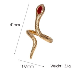 Detail of golden snake ring showing scale texture and red enamel eyes with dimensions