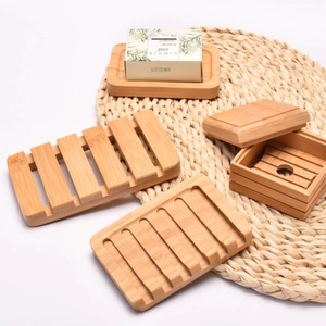 Eco-friendly bamboo soap dish set featuring self-draining slatted and wavy designs