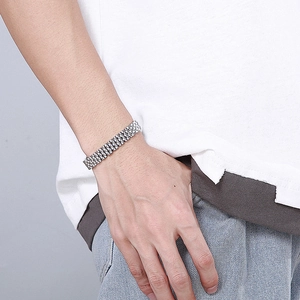 Polished silver stainless steel watch strap style bracelet for men on wrist