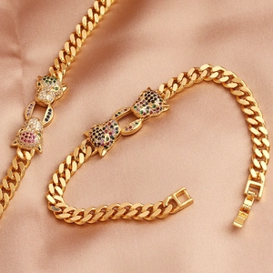 Macro detail of the hip-hop Cuban chain bracelet with leopard heads and multicolor zircons