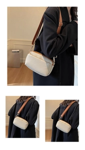 Detail shots of white crossbody square bag with adjustable brown strap on a model