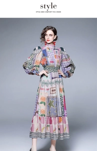 Dettaglio di un abito lungo boho con stampe patchwork colorate e maniche a sbuffo
