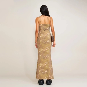 Slim fit khaki camouflage maxi dress featuring adjustable straps and an open back design