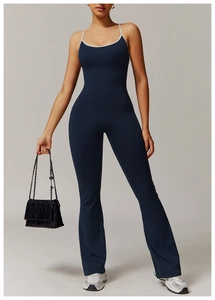 Combinaison de yoga évasée bleu marine avec dos croisé et liseré blanc contrasté