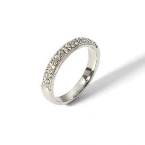 Detail view of a silver geometric ring with micro-pave sparkling cubic zirconia stones