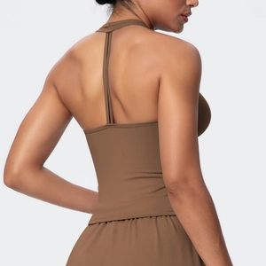 Detailed back view of brown yoga sports bra featuring racerback design and elastic fabric