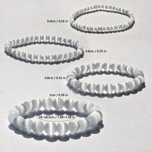 Detail view of 4mm to 10mm white cat eye stone beaded bracelets with sizing info