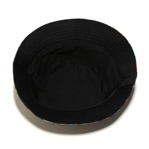 Detailed interior view of a black cotton sun hat showing stitching and sweatband