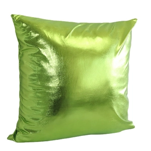 Minimalist green faux leather throw pillow with shiny metallic finish on white background