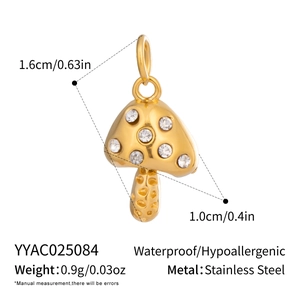 Detail view of a mushroom pendant in 18K gold stainless steel with zirconia stones