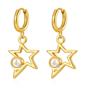Macro detail of 18K gold plated star-shaped earrings with pearls and zircon stones