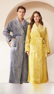Detail of extra long hooded flannel robes featuring white piping and spacious pockets