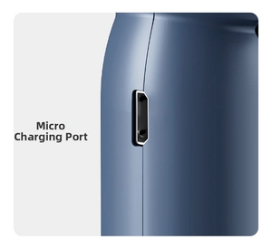 Detail view of the micro-USB charging port on a navy blue handheld mini turbine fan