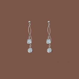 Detailed close-up of Korean style star moon earrings with elegant silver chains and opal beads