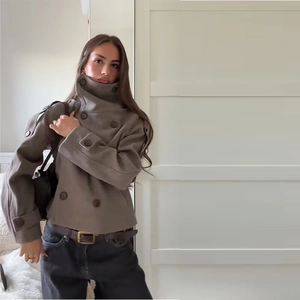 Women's vintage double-breasted taupe wool coat with high collar and cuff buckles