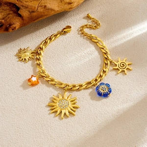 Gold-plated stainless steel NK chain bracelet with sun, star, and floral charms set