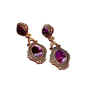 Vintage gold oval earrings with purple marble gemstone in an elegant palace style