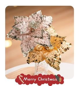 Close-up of artificial pink and gold Christmas flowers with glitter and sequins petals