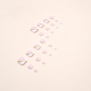Pink and white French press-on toenails with gold glitter accents and wave pattern