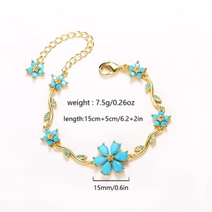 Detailed view of floral bracelet showing weight, length, and turquoise flower size