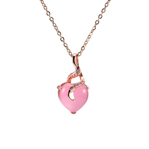 Rose gold necklace featuring a pink heart pendant with sparkling crystals on white background