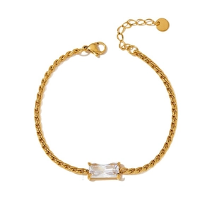 Gold cuban chain bracelet with emerald-cut zirconia center stone on white background