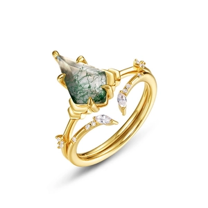 Kite cut moss agate ring with vine style gold setting and small marquise crystals
