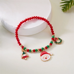 Christmas beaded bracelet with Santa Claus and tree charms on a white display stand