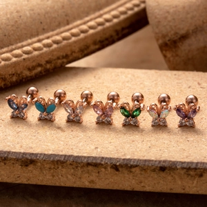 Rose gold butterfly cartilage earrings with colorful zircon stones in various shades