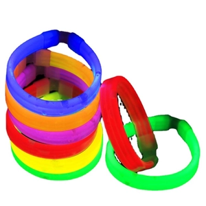 Vibrant multi-colored glowing glow stick bracelets in blue orange purple and green