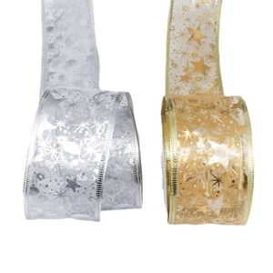 Golden and silver Christmas ribbons with star and snowflake patterns on white background