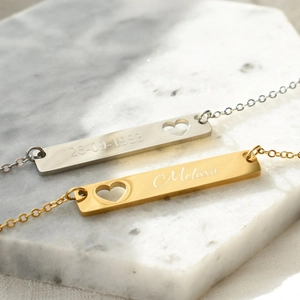 Minimalist stainless steel bar necklace with heart cutout and personalized engraving