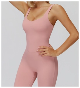 Detail of cross-back yoga bodysuit with V-waist stitching and soft brushed fabric