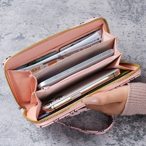 Portefeuille long rose imprimé avec design en accordéon, fentes pour cartes et téléphone