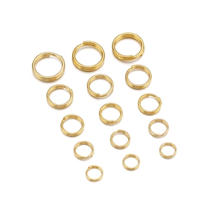 Macro view of gold plated stainless steel double jump rings in various sizes for jewelry