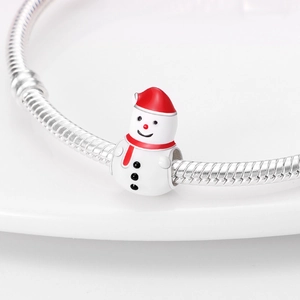 Silver-plated snowman charm with red enamel hat on a sleek snake chain bracelet