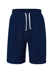Macro detail of dark blue waffle knit fabric on men's quick-dry casual shorts