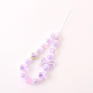 Fashionable purple beaded phone strap with bow and heart charms for women