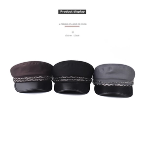 Three stylish baker boy hats in coffee, black and grey with silver chain detail