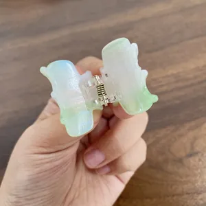 Mini acetate hair claw clip with pearlescent gradient green finish for women