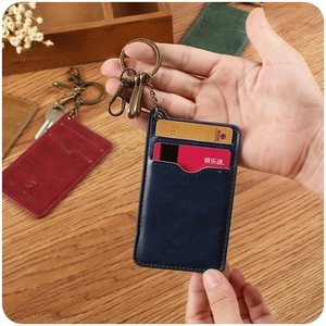 Vintage navy leather card holder keychain with bronze ring and double card slots
